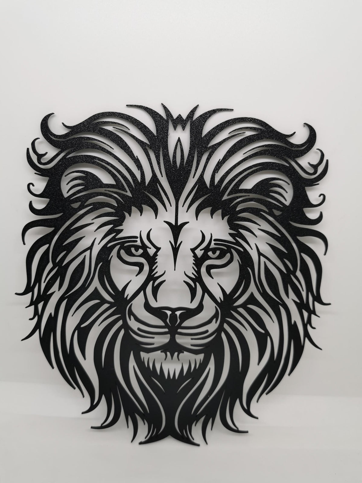 Löwenkopf Wandbild, kraftvolle Löwen-Silhouette, moderne Wanddeko, Symbol für Stärke und Mut